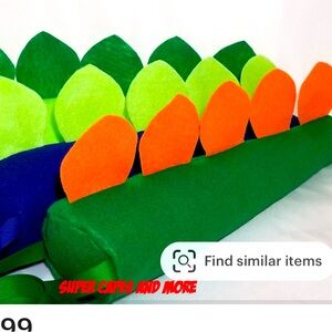 Dinosaur tail with ribbon to tie on.